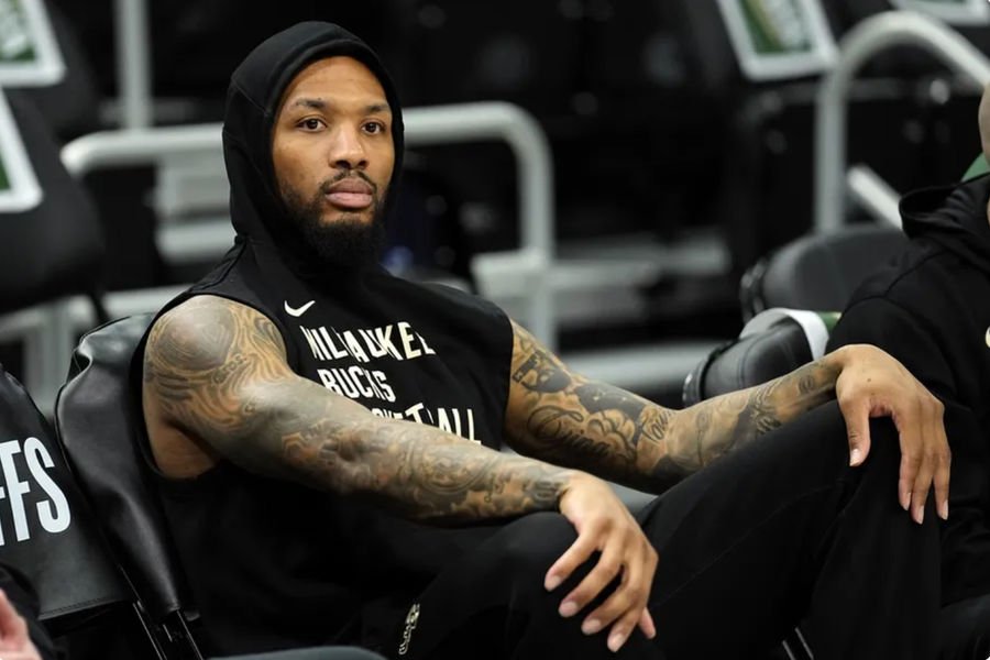 Wisconsin, USA; Milwaukee Bucks guard Damian Lillard (0) looks on during warmups prior to game five of the first round for the 2024 NBA playoffs against the Indiana Pacers at Fiserv Forum. Mandatory Credit: Jeff Hanisch-Imagn Images