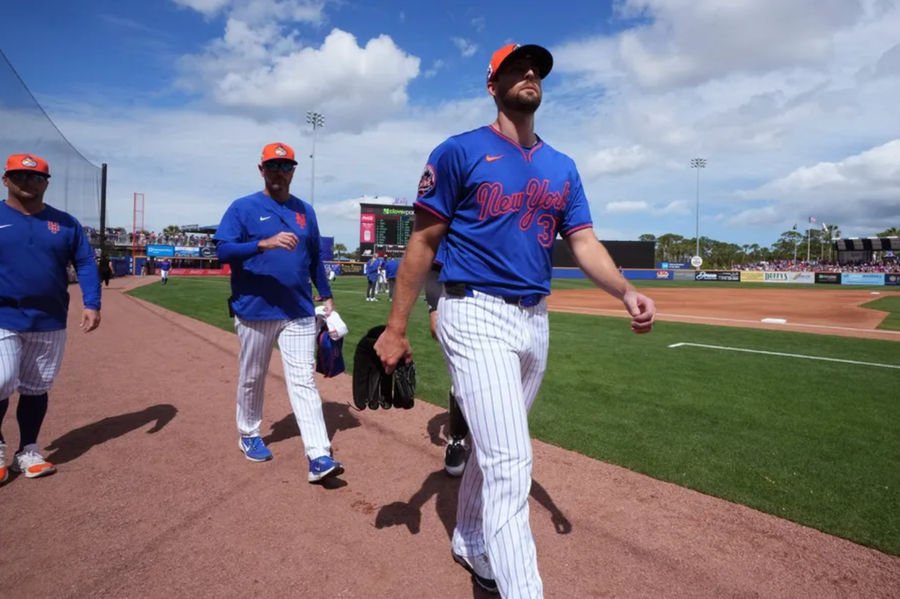 Feb 22, 2025; Port St. Lucie, Florida, USA; New York Mets pitcher Clay Holmes (35) walks in from the bullpen area before the game against the Houston Astros at Clover Park. Mandatory Credit: Jim Rassol-Imagn Images