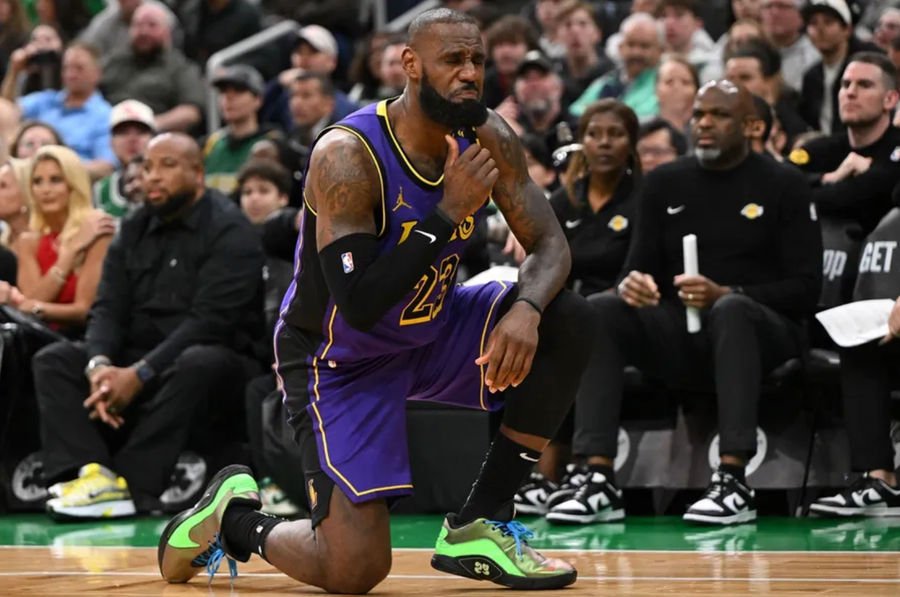 Mar 8, 2025; Boston, Massachusetts, USA; Los Angeles Lakers forward LeBron James (23) reacts after being fouled by Boston Celtics forward Jayson Tatum (not seen) during the fourth quarter at the TD Garden. Mandatory Credit: Brian Fluharty-Imagn Images
