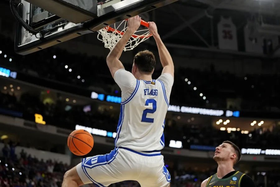 Mar 23, 2025; Raleigh, NC, USA; Duke Blue Devils forward Cooper Flagg (2) dunks the ball during the first half against the Baylor Bears in the second round of the NCAA Tournament at Lenovo Center. Mandatory Credit: Bob Donnan-Imagn Images