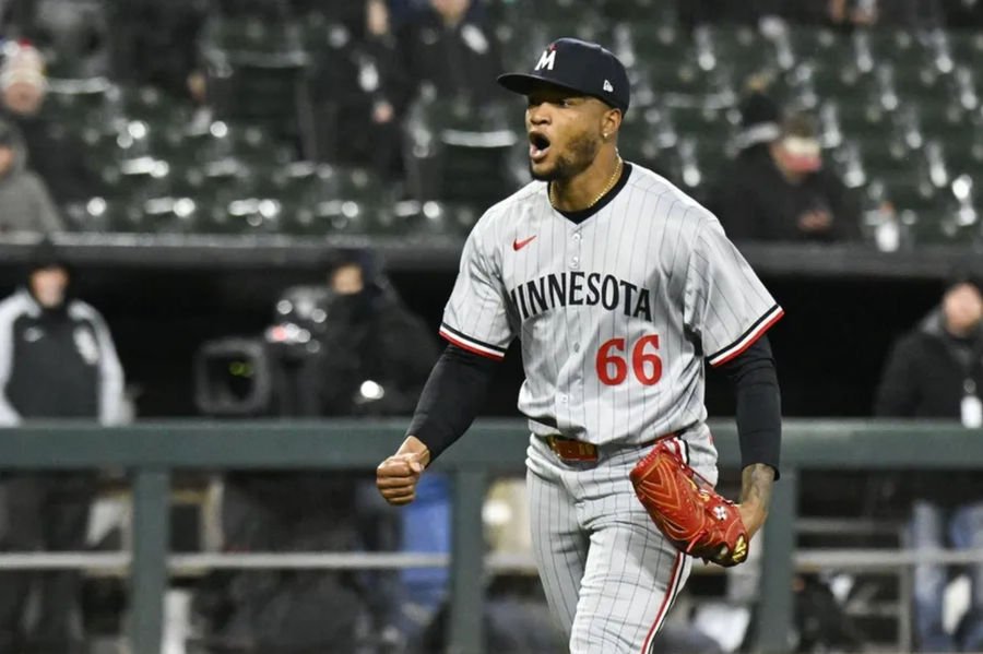 Apr 1, 2025; Chicago, Illinois, USA; Minnesota Twins pitcher Jorge Alcala (66) reacts after closing out the seventh inning against the Chicago White Sox at Guaranteed Rate Field. Mandatory Credit: Matt Marton-Imagn Images
