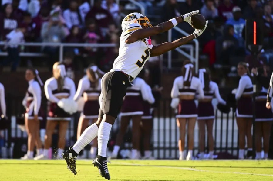 Nov 23, 2024; Starkville, Mississippi, USA; Missouri Tigers wide receiver Luther Burden III (3) attempts to make a reception against the Mississippi State Bulldogs during the first quarter at Davis Wade Stadium at Scott Field. Mandatory Credit: Matt Bush-Imagn Images