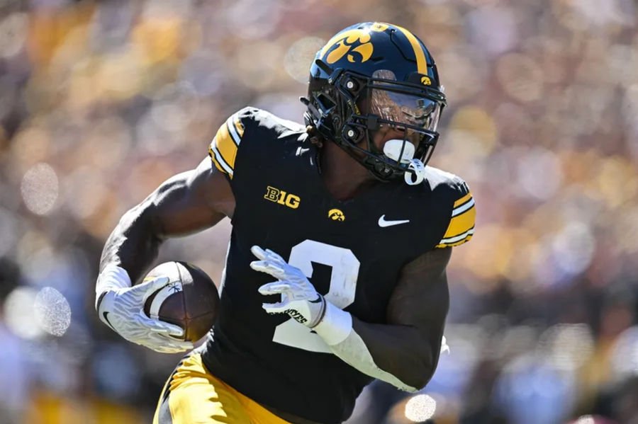 Sep 7, 2024; Iowa City, Iowa, USA; Iowa Hawkeyes running back Kaleb Johnson (2) runs for a 27 yard touchdown against the Iowa State Cyclones during the first quarter at Kinnick Stadium. Mandatory Credit: Jeffrey Becker-Imagn Images