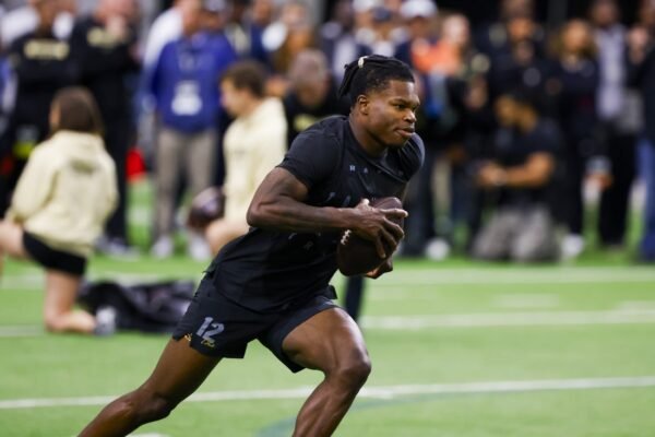 Giants GM says Travis Hunter can play both ways if he falls to No. 3