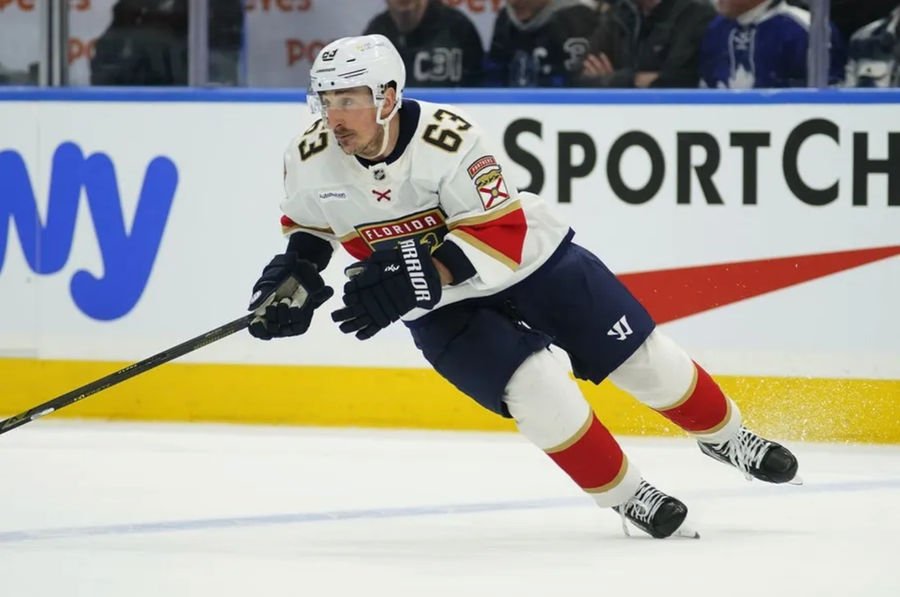 Apr 2, 2025; Toronto, Ontario, CAN; Florida Panthers forward Brad Marchand (63) skates against the Toronto Maple Leafs at Scotiabank Arena. Mandatory Credit: John E. Sokolowski-Imagn Images