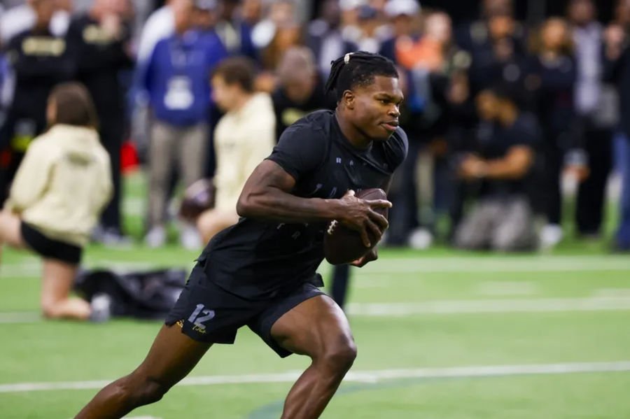 Apr 4, 2025; Boulder, CO, USA; Colorado Buffaloes wide receiver Travis Hunter (12) runs drills at the University of Colorado NFL Showcase at the CU Indoor Practice Facility. Mandatory Credit: Michael Ciaglo-Imagn Images