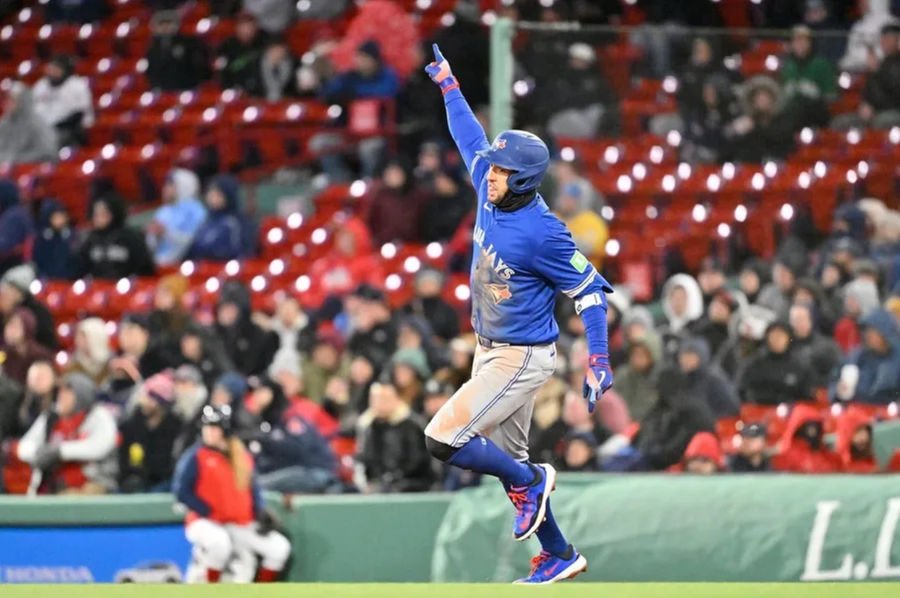 Apr 8, 2025; Boston, Massachusetts, USA; Toronto Blue Jays right fielder George Springer (4) runs through bases after hitting a home run against the Boston Red Sox during the sixth inning at Fenway Park. Mandatory Credit: Eric Canha-Imagn Images