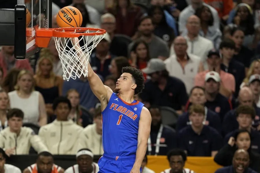 Apr 5, 2025; San Antonio, TX, USA; Florida Gators guard Walter Clayton Jr. (1) shoots the ball against the Auburn Tigers during the first half in the semifinals of the men's Final Four of the 2025 NCAA Tournament at Alamodome. Mandatory Credit: Scott Wachter-Imagn Images