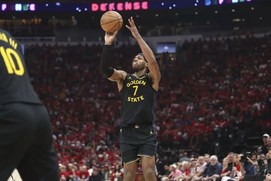 May 4, 2025; Houston, Texas, USA; Golden State Warriors guard Buddy Hield (7) shoots the ball and scores during the second quarter of game seven of the first round for the 2025 NBA Playoffs against the Houston Rockets at Toyota Center. Mandatory Credit: Troy Taormina-Imagn Images